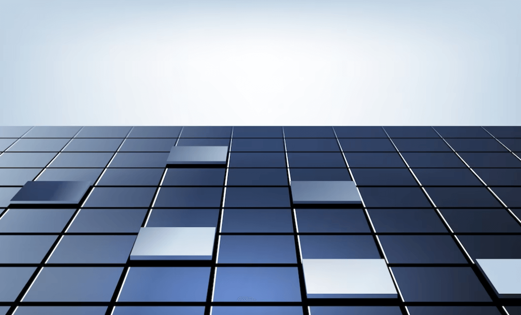 Photovoltaic glass tiles integrated into building materials